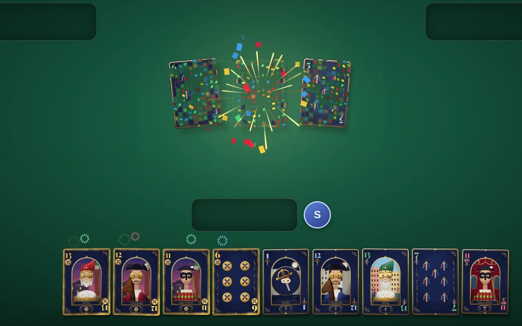 A trick taken with a trump in the Venetian Carnival deck breaking into confetti with gold sparks in the middle of the table