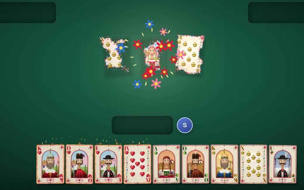 A trick taken with a trump in the Hungarian Puszta deck coming apart into red, pink and blue embroidered flowers in the middle of the table